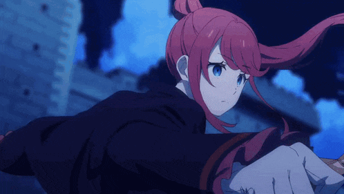 a girl with red hair and blue eyes is standing in front of a castle