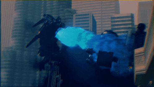 a blurred image of a robot with a blue flame coming out of it 's mouth