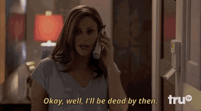 a woman talking on a cell phone with okay well i 'll be dead by then