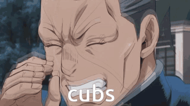 a man with his eyes closed has the word cubs on his mouth
