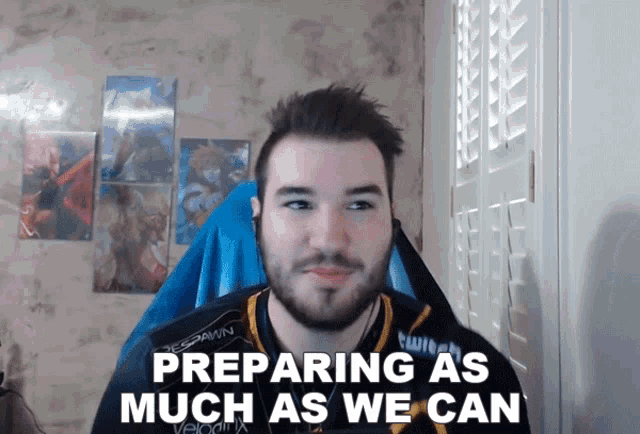 a man is preparing as much as we can while sitting in a chair