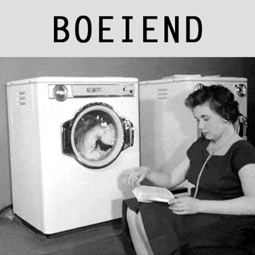 a woman sits in front of a washing machine with the word boeiend above her