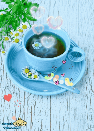 a cup of coffee on a saucer with a spoon and a picture of a dog on the bottom right
