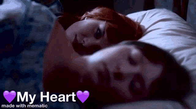 a man and a woman are laying in bed with the words my heart made with mematic below them
