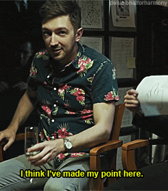 a man in a floral shirt is sitting in a chair and says i think i ve made my point here