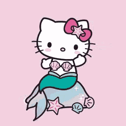 hello kitty is dressed as a mermaid and sitting on a rock with a dolphin in the background .