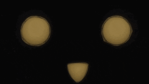 a yellow smiley face with two eyes and a smile