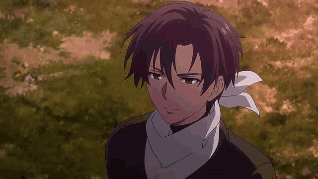 a young man with a scarf around his neck looks at the camera