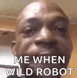 a close up of a man 's face with the words `` me when wild robot '' on it .