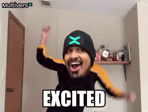 a man wearing a black beanie with a green x on it is excited