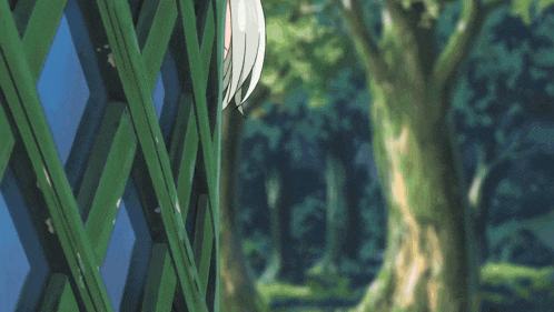 a girl with white hair and blue eyes peeking through a green fence