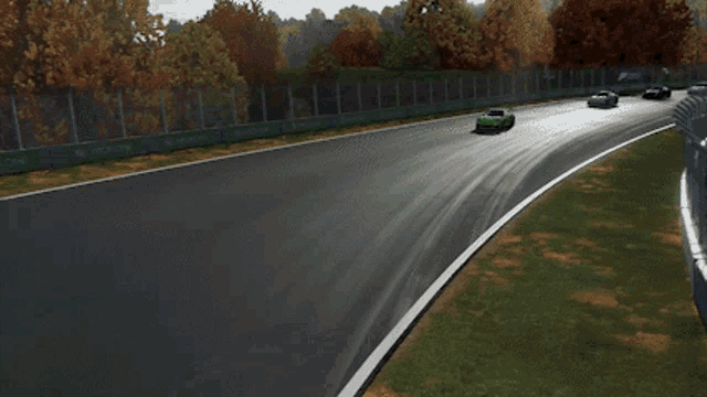 a green sports car with the word gt3 on it