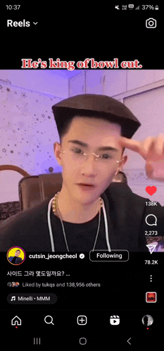 a man wearing glasses and a hat with the words he 's king of bowl cut