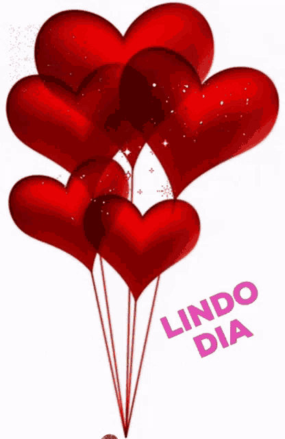 a bunch of red hearts with lindo dia written below them