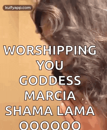 a woman with long hair is worshiping a goddess .