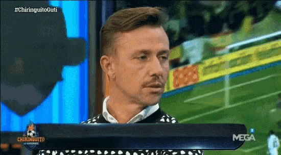 a man with a mustache is on a mega channel