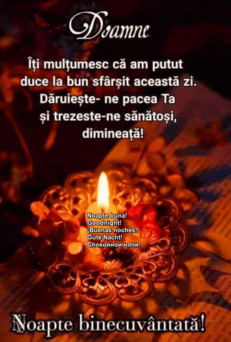 a picture of a lit candle with a foreign language written on it