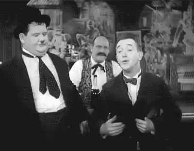Laurel And Hardy Smack GIF
