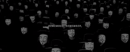 a crowd of people wearing masks with the words remember remember