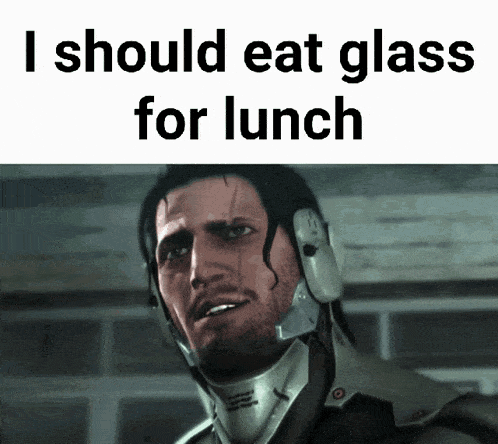 a picture of a man with a helmet on that says i should eat glass for lunch
