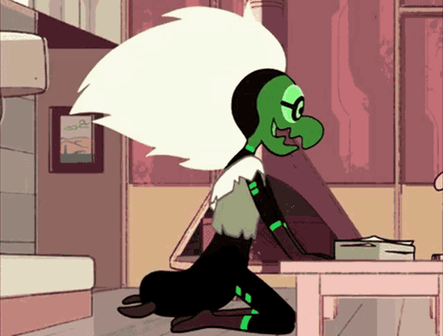 a cartoon character with a green face is kneeling down