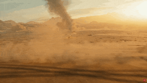 an aerial view of a tornado in the desert with the letters aa on the bottom right