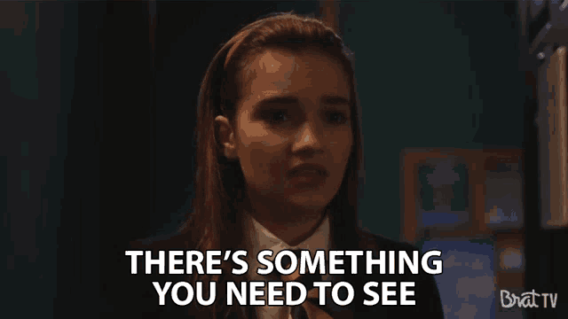 a girl says there 's something you need to see in a video