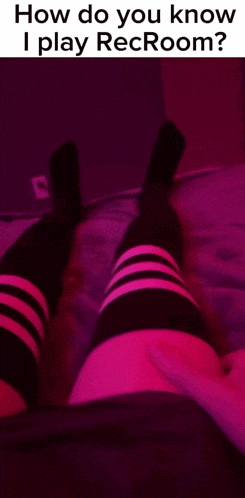 a person wearing striped knee high socks is laying on a bed with the words how do you know i play recroom