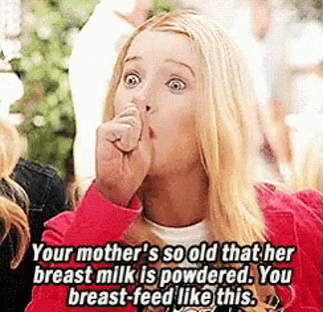 a woman in a red jacket is saying your mother 's so old that her breast milk is powdered you breast feed like this