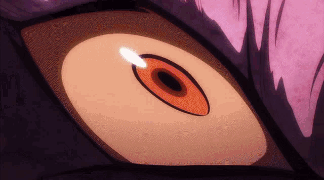 a close up of a person 's eye with a pink background