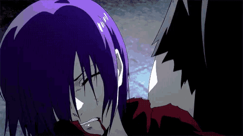 a woman with purple hair is being held by a man with blood on his face .