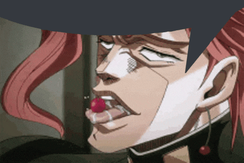 a close up of a person with a cherry in their mouth