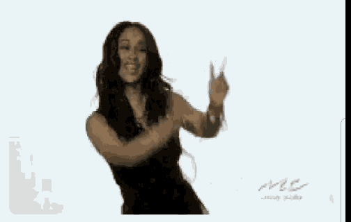 a woman in a black dress is dancing with her arms outstretched