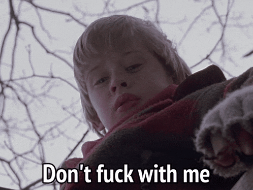 a picture of a boy with the words " do n't fuck with me "