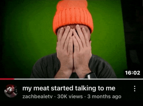 a video of a man covering his face with his hands with the time of 16:02