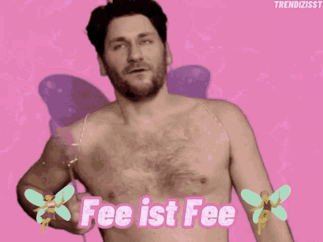 a shirtless man with fairy wings has the words fee ist fee on his chest