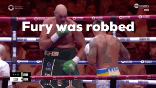 a boxing match with the words fury was robbed