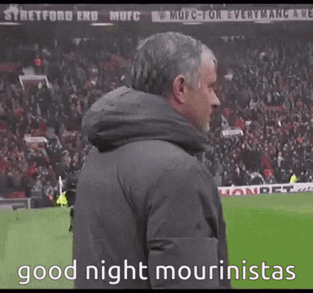 a man standing on a soccer field with the words good night mourinistas written on the bottom