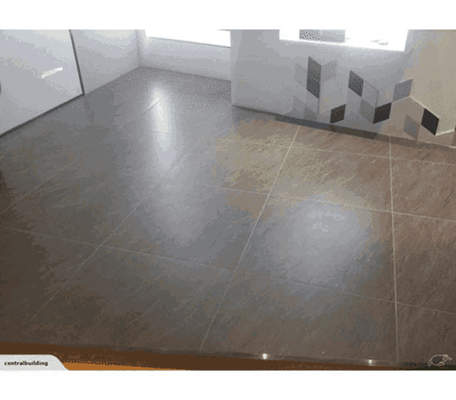 a picture of a tiled floor with the words central building underneath