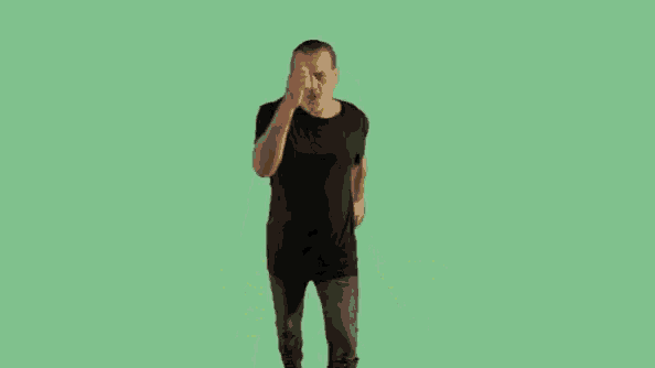 a man in a black shirt is jumping in the air with dioni ca written on the bottom of the image