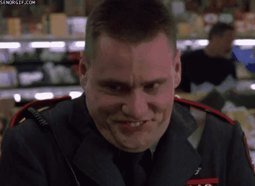 a man in a military uniform is looking at the camera