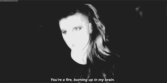 a black and white photo of a woman with a quote .