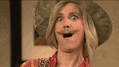 a woman wearing a cowboy hat and a mustache is making a surprised face .