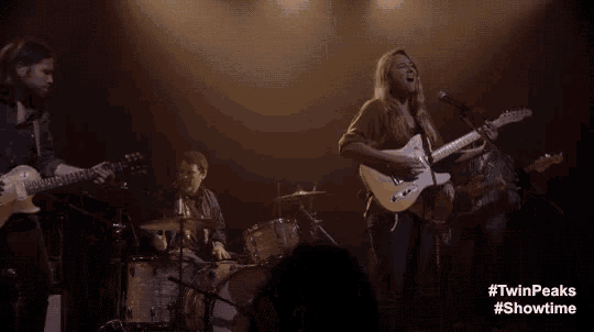 a group of people playing instruments on a stage with the words #twinpeaks #showtime written on the bottom