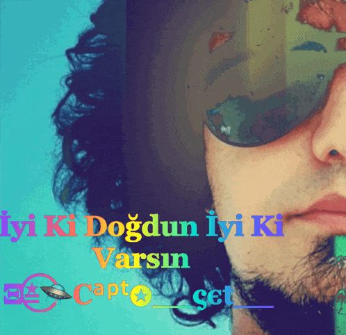 a man wearing sunglasses has the words iyi ki dogdun iyi ki varsin written above his face