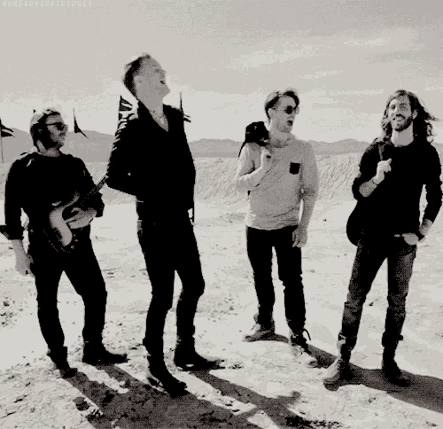 a group of men standing in a desert with the words #goreoverpictures written on the bottom right