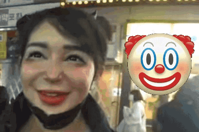 a woman is smiling next to a clown face with the number 00 on it