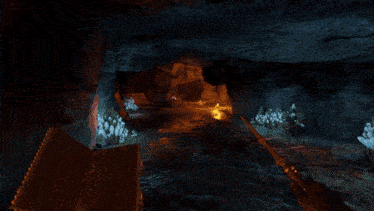 a person is holding an open book with a purple light coming out of it in a cave