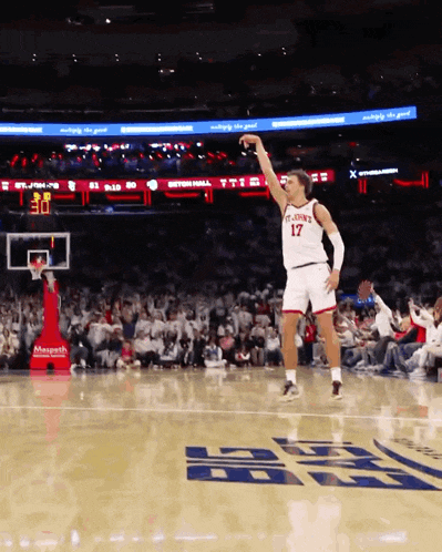 a basketball player wearing a jersey that says st. johns on it