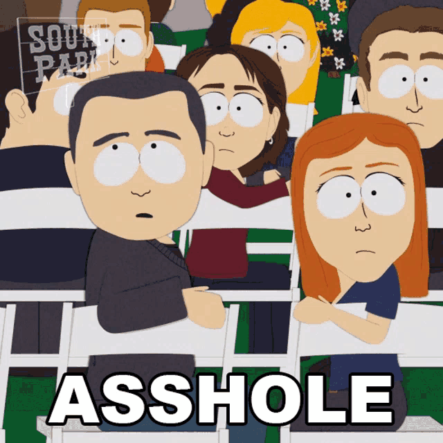 a group of people are sitting in chairs and the word asshole is on the screen